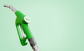 Filling nozzle on green background