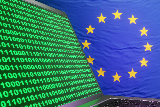 istock Silver laptop showing computer binary code on European Union flag. Illustration of the concept of EU computer misuse act and cybercrime 1457349222