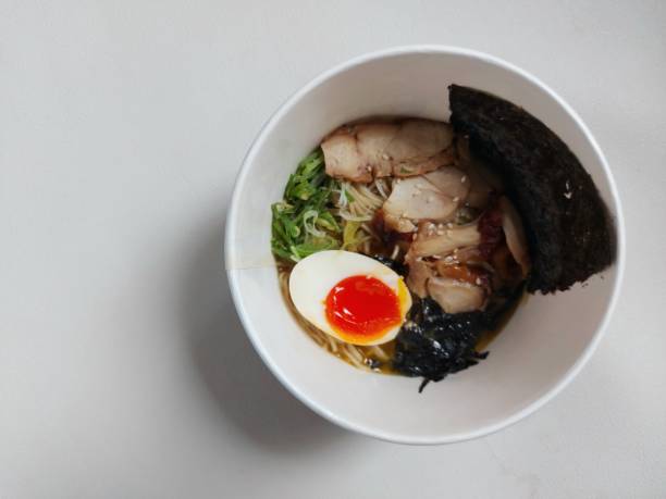 istock Chicken ramen noodle on paper bowl 1457349333