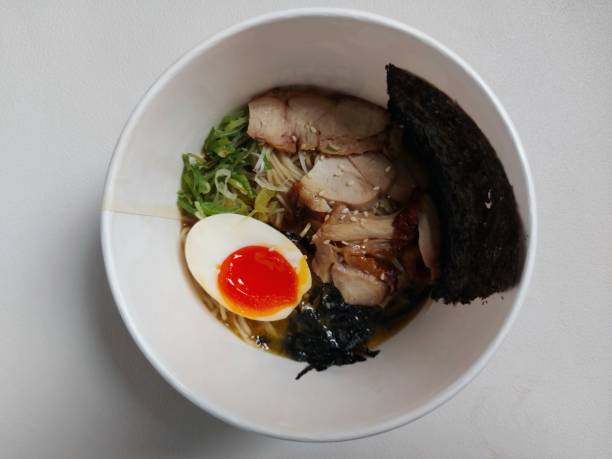 istock Chicken ramen noodle on paper bowl 1457349340