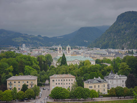 Historic city of Salzburg in summer, Austria. view on Andrae Church Salzburg and Mirabell Palace from other side Salzach river