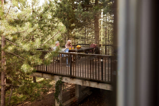istock Happy mature couple talking while relaxing on a terrace. 1457353666