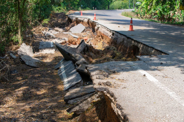 istock Edge Of A Road That Has Been Eroded By Water. 1457355332
