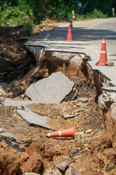 istock Edge Of A Road That Has Been Eroded By Water. 1457355391