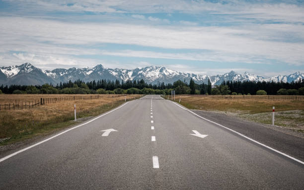 view along road towards mount cook national park - new zealand forest landscape mountain imagens e fotografias de stock