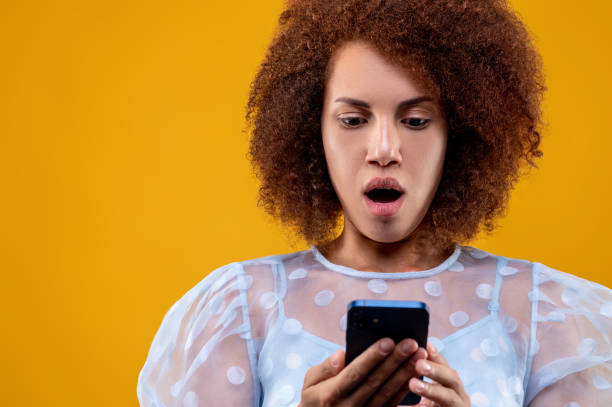 istock Young woman with a smartphone in hands 1457357514