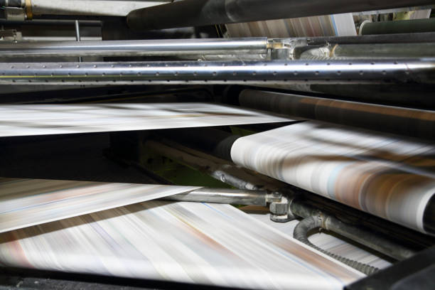 istock Newspaper folding machine in a printing plant 1457359465