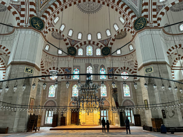 Şehzade mosque in Fatih area in old town Istanbul, Turkey Interior of the Sehzade mosque in Istanbul, Turkey. Sehzade Mosque is an Ottoman imperial mosque located on the third hill of Istanbul, Turkey. It is sometimes referred to as the Prince's Mosque. Built in 1548. Şehzade Mosque (Şehzade Camii) was one of the masterpieces of Architect Sinan. turkey koran people design stock pictures, royalty-free photos & images