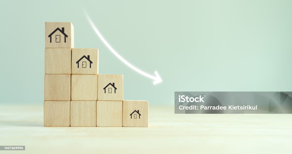 Downsizing home or crisis in the real estate market, housing market crash concept. Reducing demand for home buying. Downsizing property due to retirement or budget. Finding a tiny house or apartment. Apartment Stock Photo