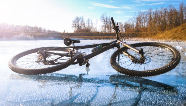 Mountain bicycle lying on a frozen lake