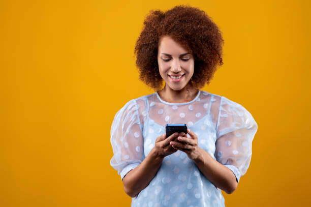 istock Young woman with a smartphone in hands 1457373695