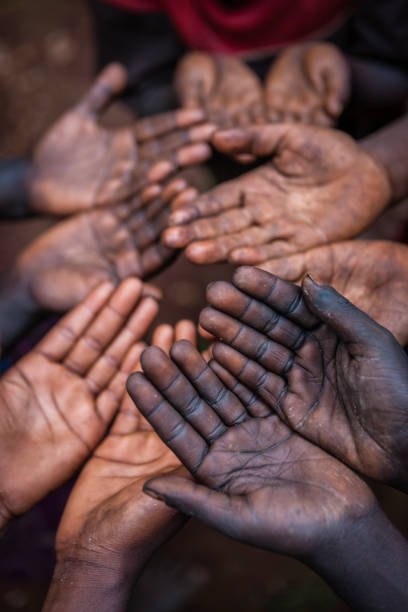 istock Hungry African children asking for help, Africa 1457380630