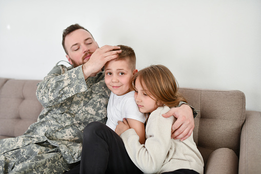 Soldier Father Getting Last Look Of Children Before Going On Tour
