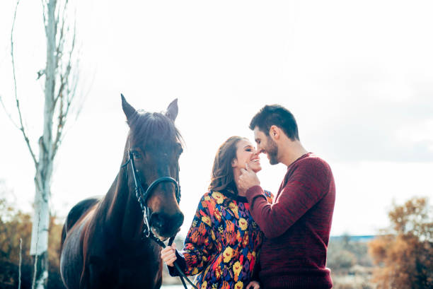 istock Wedding couple with a horse 1457385260