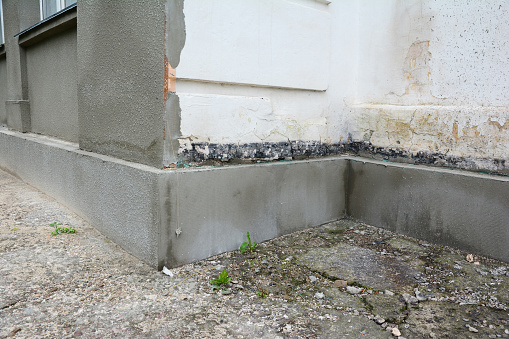 House foundation repair, foundation renovation with insulation, waterproofing and plastering.