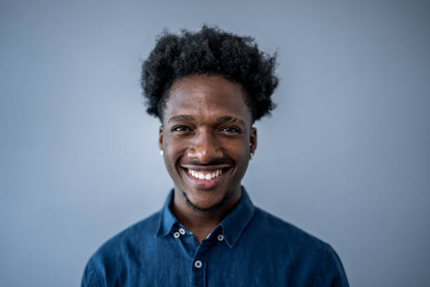 istock Portrait of a young man on a gray background 1457385980