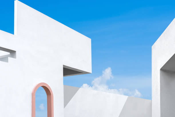 istock Building white wall construction and window on blue sky background on day, well space for text present 1457386832
