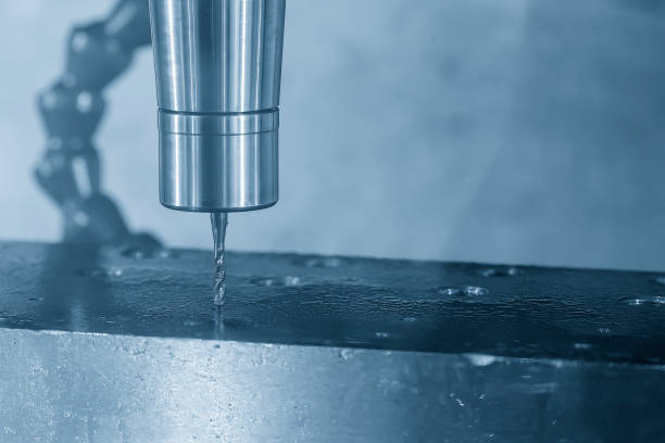 istock The CNC milling machine tapping process at aluminum part. 1457389184