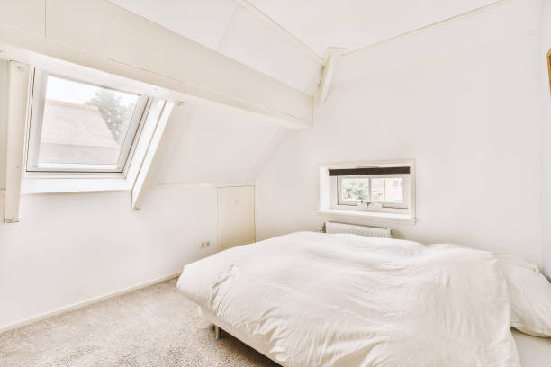 istock Light bedroom with wooden wardrobe 1457389409
