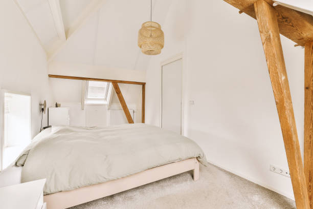 istock Light bedroom with wooden wardrobe 1457389563