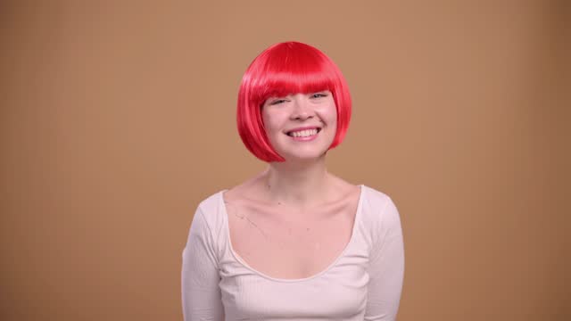 Woman in red wig.