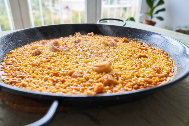 istock steaming fish and seafood paella with shrimp 1457393591