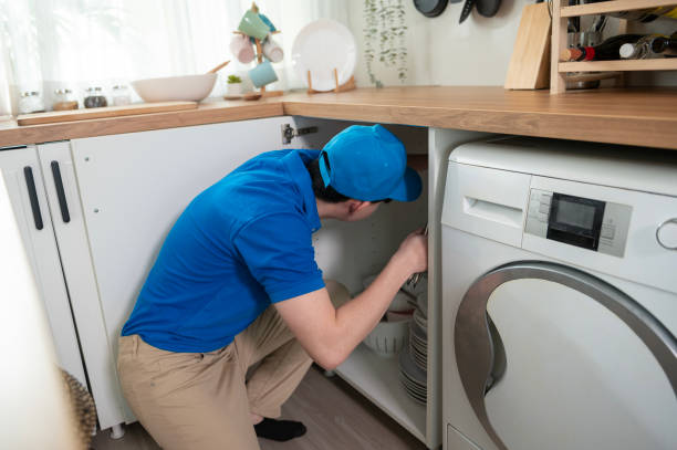 istock An Asian young Technician service man wearing blue uniform checking electrical appliances in home 1457395292