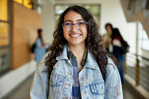 istock Portrait of cheerful young university student 1457395449