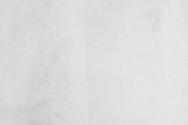 istock Modern grey paint limestone texture background in white light seam home wall paper. Back flat subway concrete stone table floor concept surreal granite quarry stucco surface background grunge pattern. 1457396120