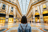 Young Female Tourist In Galleria Vittorio Emanuele II In Milan