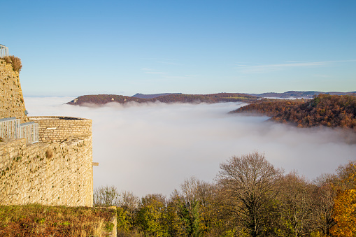 Above the clouds. View of the fog in the valley from Hohen Neuffen Castle.
