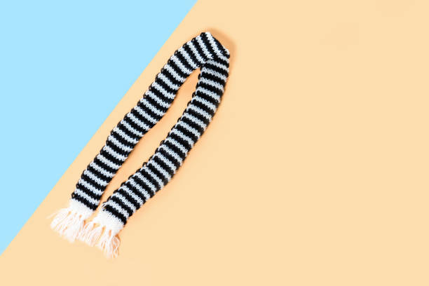 Warm scarf for cold weather. Spring clothing. Stylish access to people.