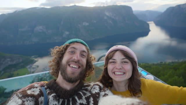 Selfie of man  and woman on the background of fjord  in Norway