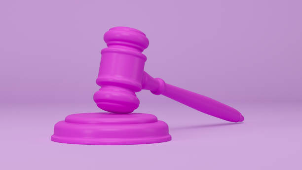 istock Magenta judge gavel on violet background with shadow 3d illustration 1457403953