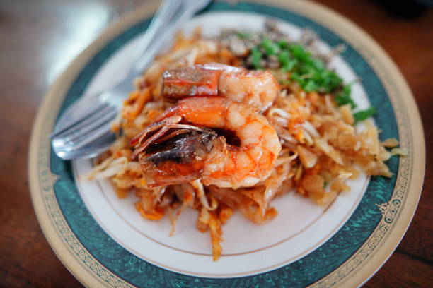 Pad Thai or Thai Style Fried Noodle Topped with Prawns
