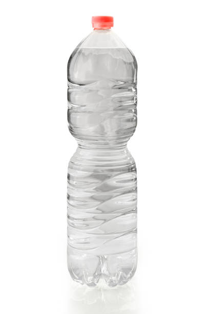istock Bottle of water with pink cap isolated 1457408839
