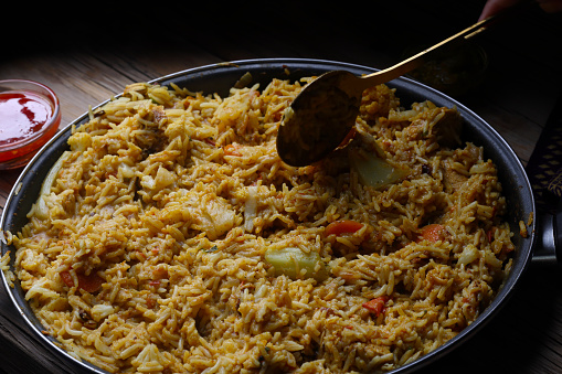 Stirring Chicken Biryani