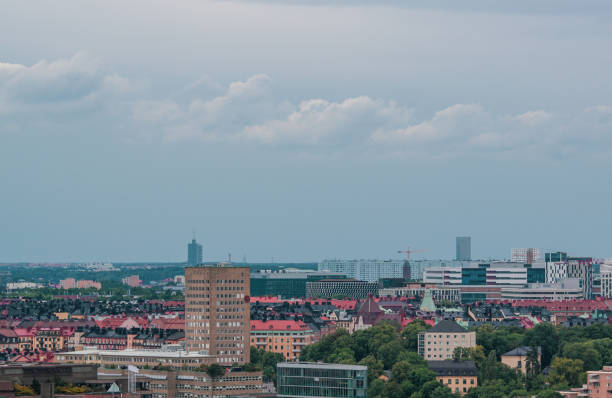 istock High angle view of city buildings against sky 1457420475