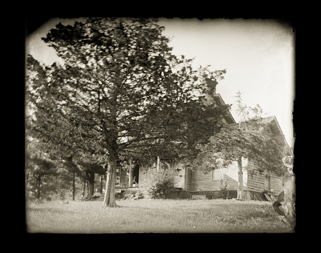 Beautiful Black and White portrait of a Victorian-era farm and farmhouse sitting on top of a hill. The image was digitally restored from a glass plate taken circa 1890.