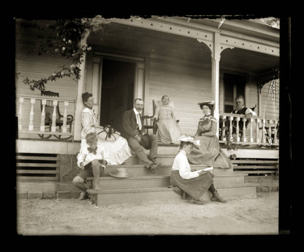 istock The Sabbath, Family sitting on their front porch, Circa 1890 1457421943