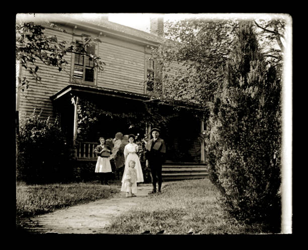 istock Family in Front of a Farmhouse, Circa 1890 1457422998