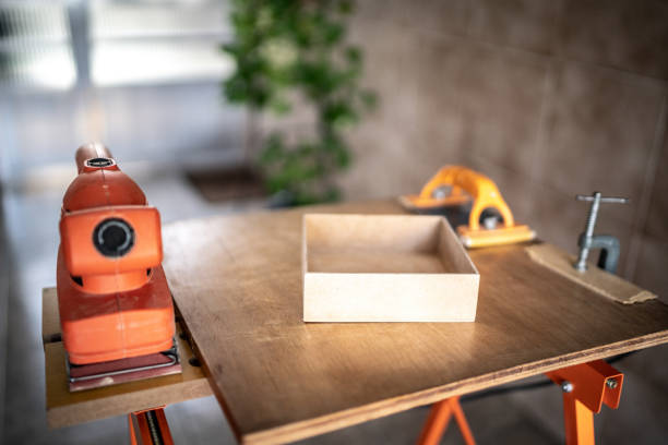 Close-up of an electric sander on the table