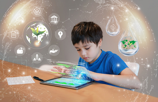Education technology,Kid using tablet research on internet about world population,Ecology,Environmental,School Boy doing online learning,Geography with Double exposure growth leaf on globe map