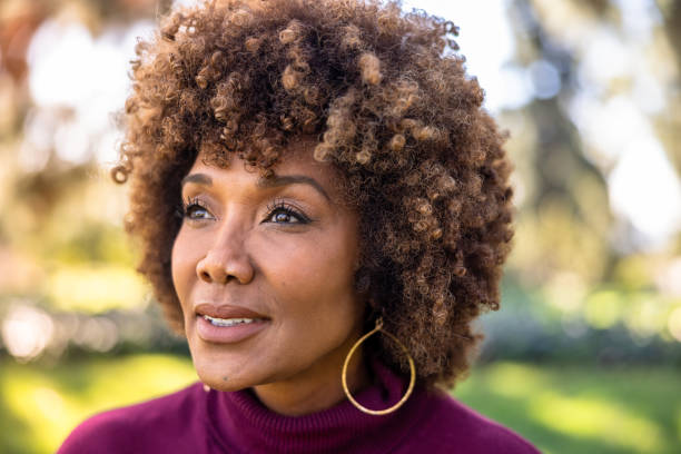 istock Beautiful Black Woman Looking Up 1457435989