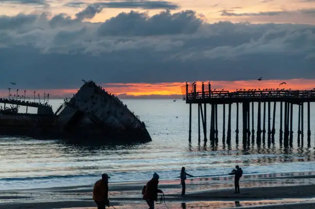 Silhoutte of the SS Palo Alto, an old World War II shipwreck, around sunset off the coast of Aptos, Californa, near seacliff beach.