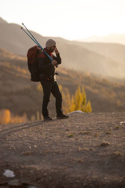 istock Young man traveling and walking on the forest walkway trail 1457452526