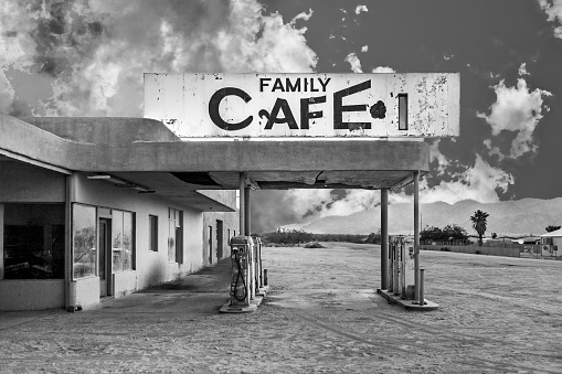 abandoned petrol station in the desert village of Desert Center in sunset