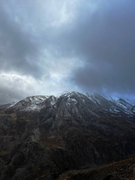 istock Aerial view of hiker on mountain summit 1457455022