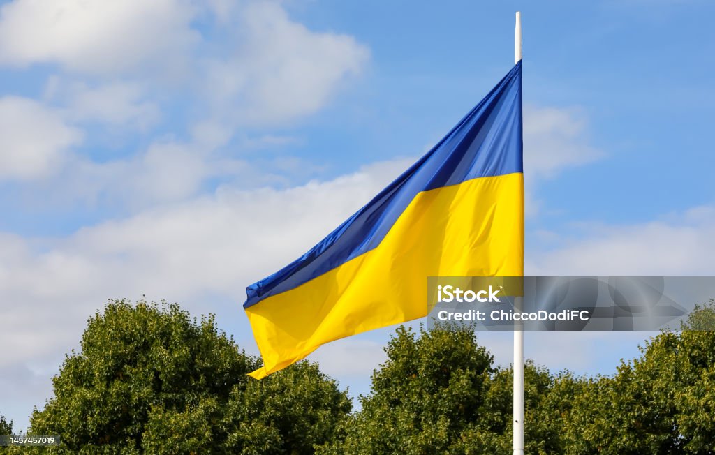 blue and yellow colors of Ukraine flag blue and yellow colors of Ukraine flag and blue sky Capital Cities Stock Photo