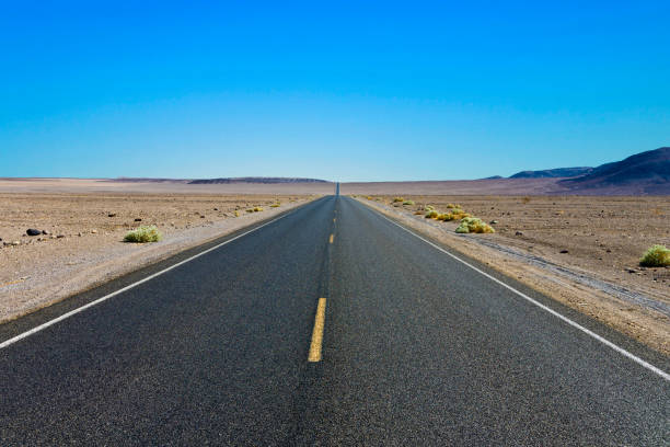 istock driving on the Interstate 187 in Death valley 1457457905